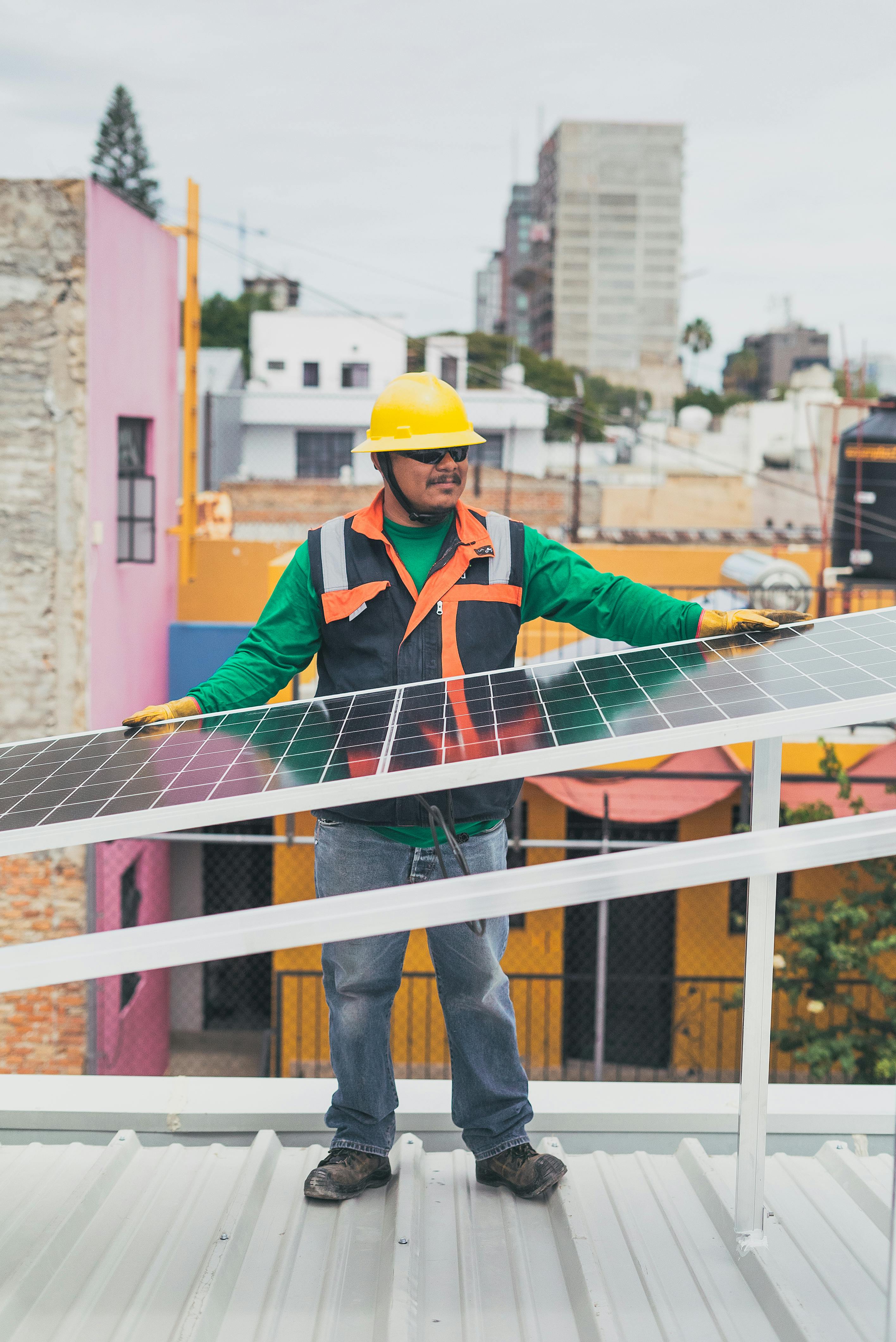 A person installing solar panel in a home