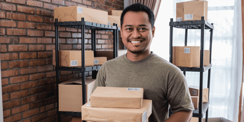 Business owner holding a package