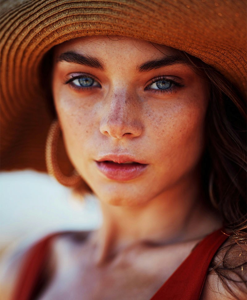 a woman getting a facial massage on her face