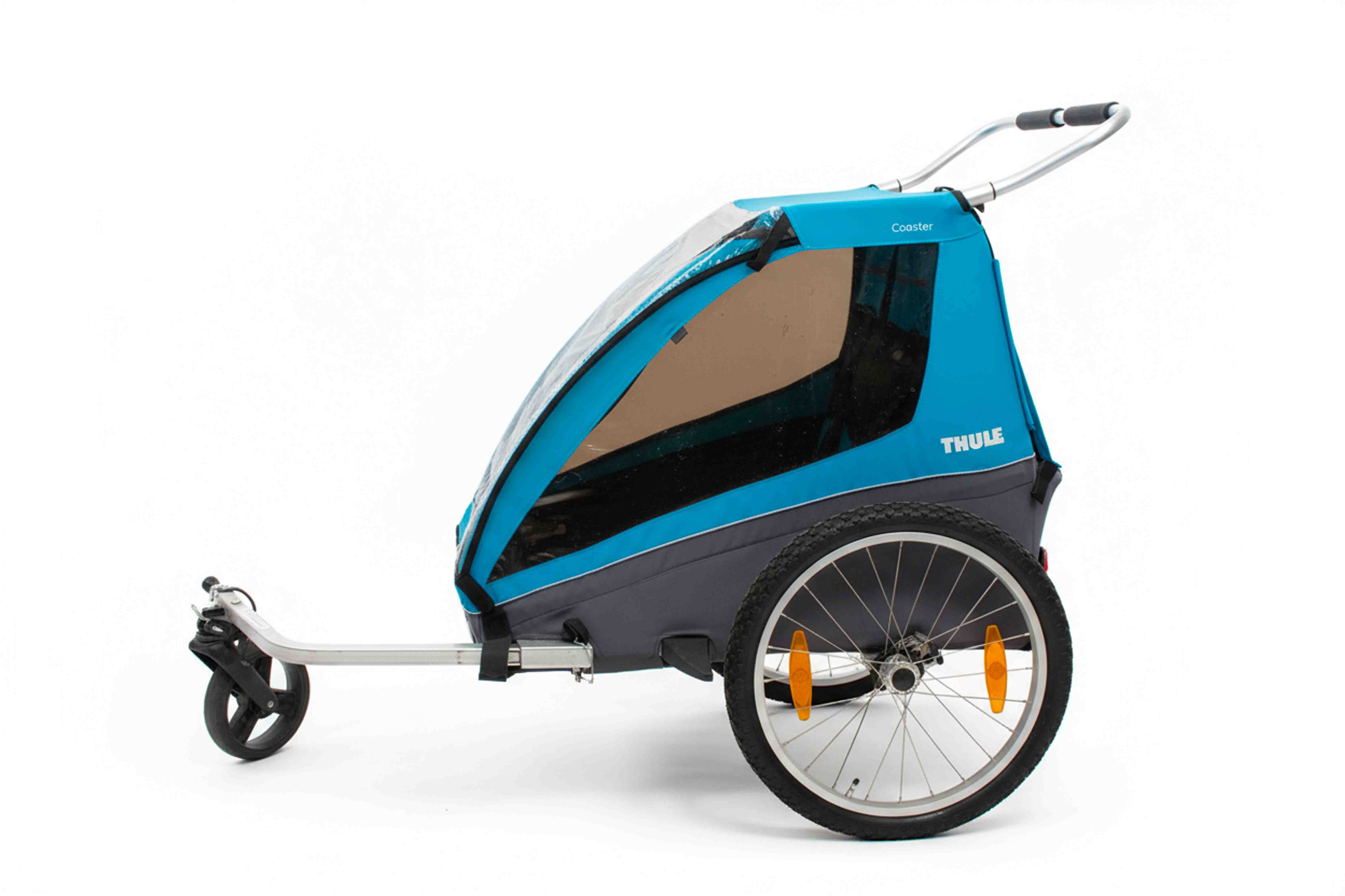 Thule Coaster cykelvagn i blått och svart, stabil tvåhjulig barnvagn med fönster och dragstång för säker cykling, till salu i Uppsala