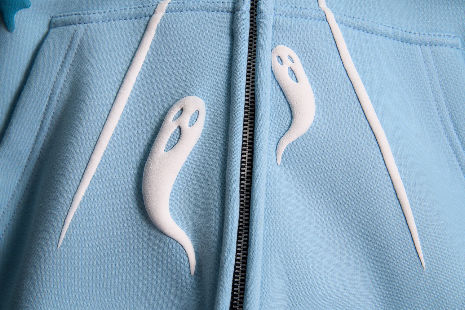 Tuko Clothing blue Dandadan inspired tracksuit detail shot photographer by Matthew Brown (London product photographer).