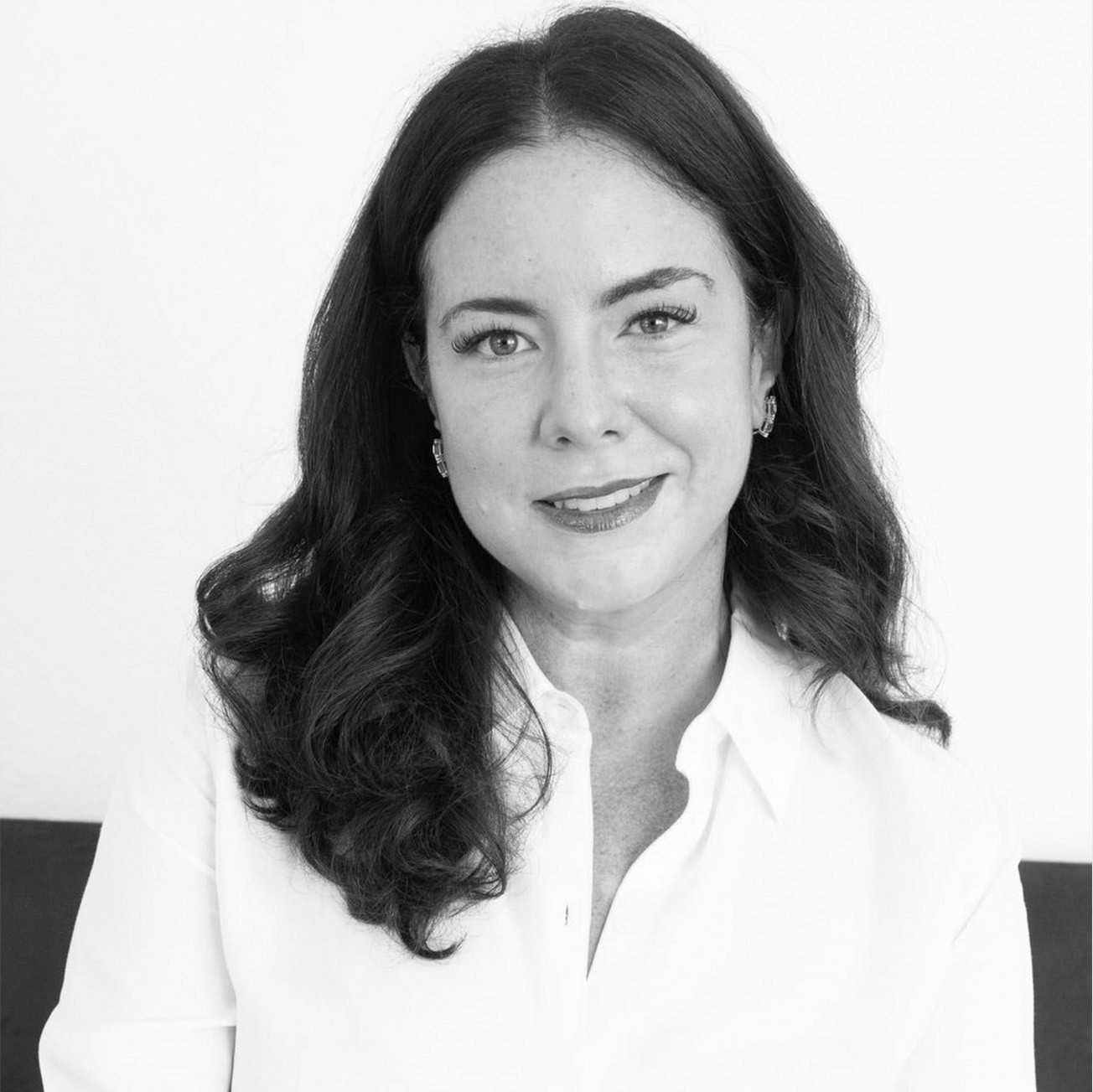 Photo of Prof. Ashley V. Whillans smiling