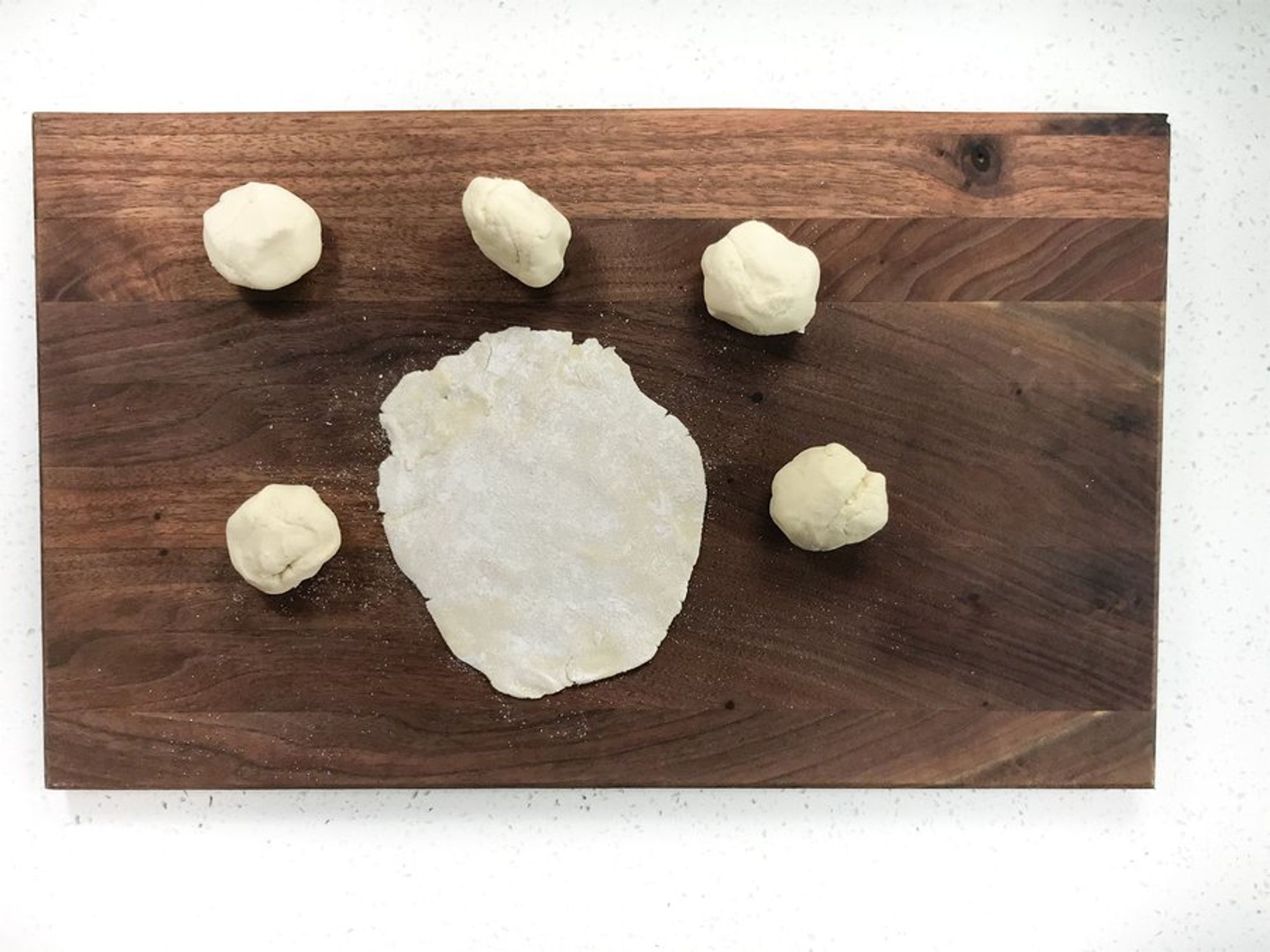 a soft cassava dough formed into small circles