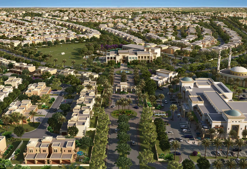 Aerial view of Arabian Ranches 2, showcasing lush greenery, modern villas, and winding pathways in a serene community setting