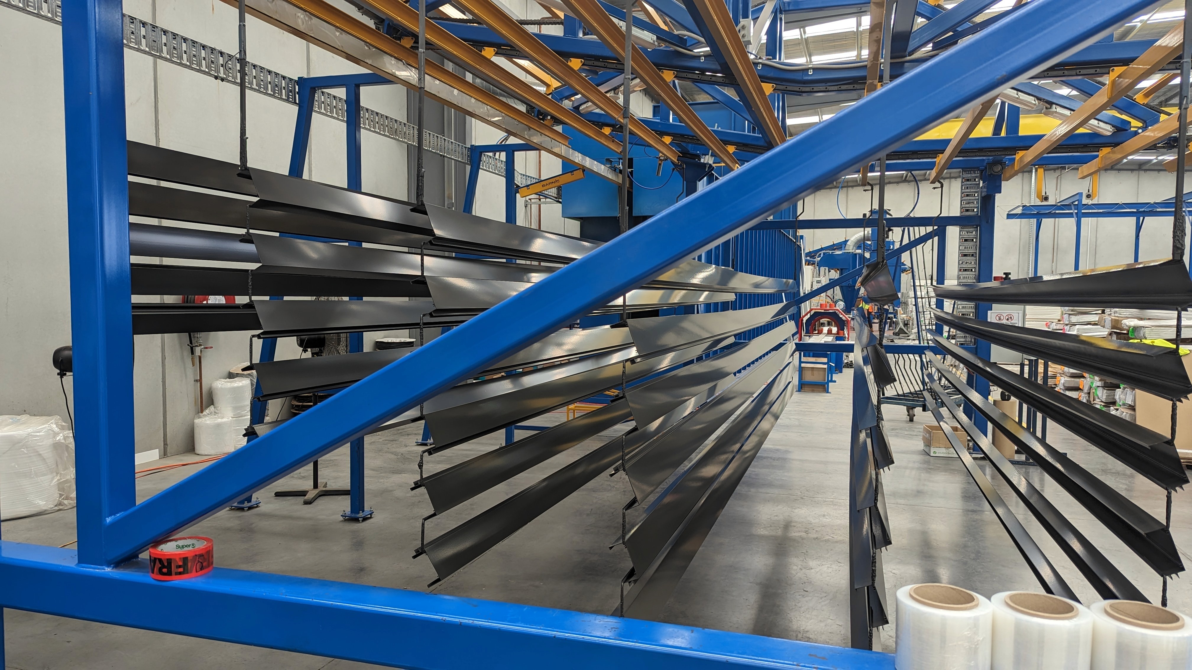 stack of aluminium extrusion with black color finishing.