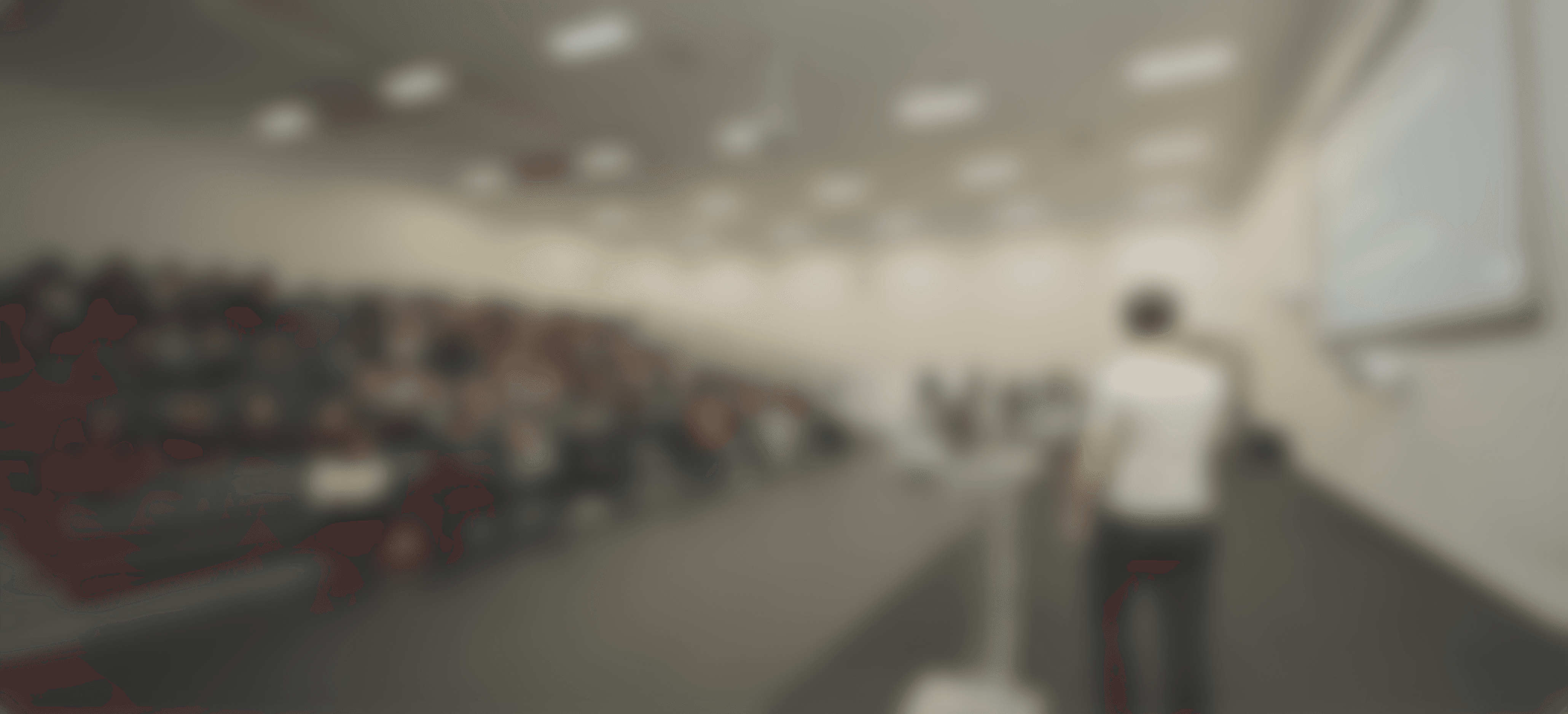 Modern spiral staircase with wooden accents and lighting