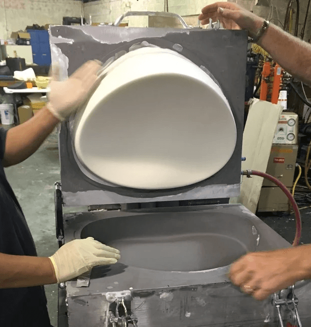 UNDO meditation cushion form being removed from a production mold