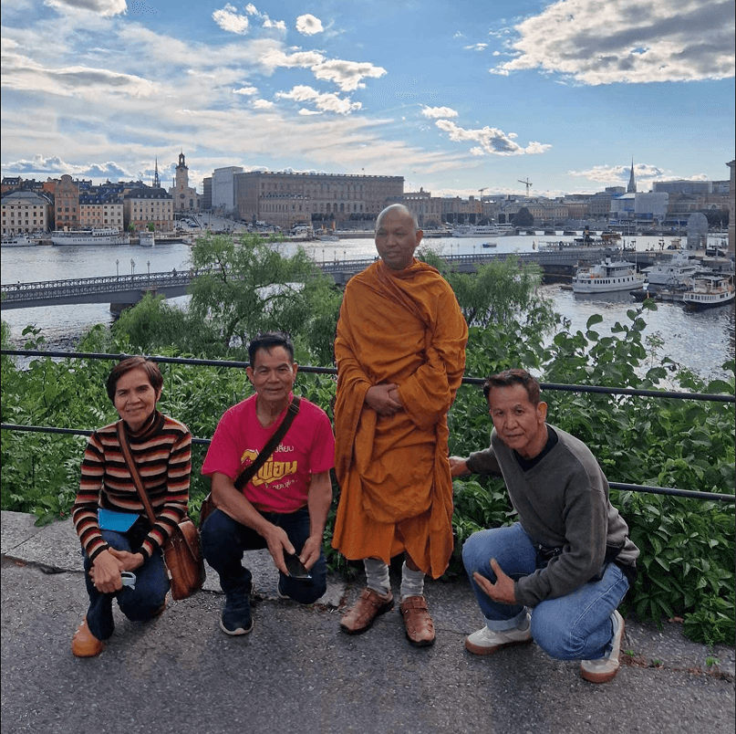 Tourists exploring Stockholm during private electric sightseeing cart tour