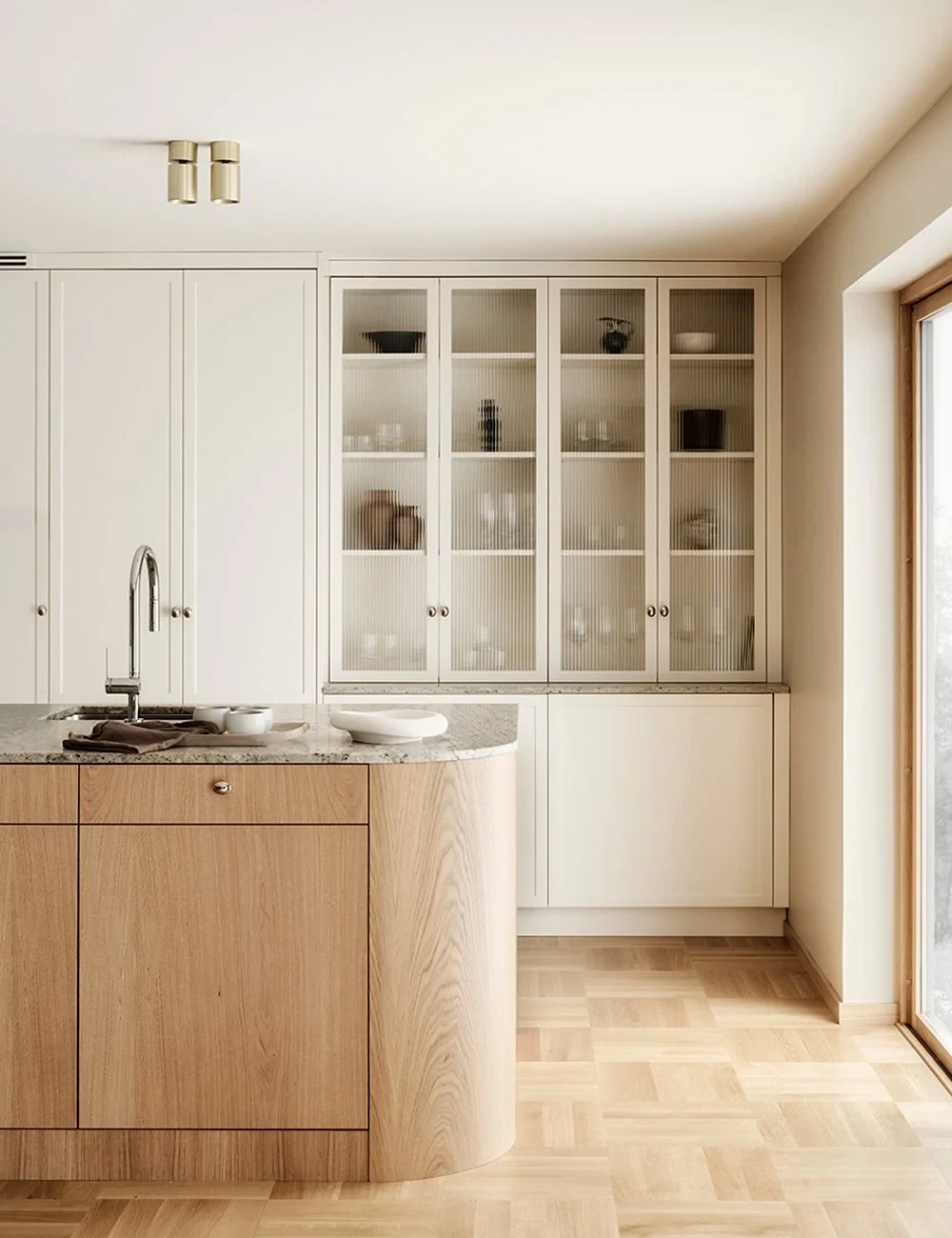 an empty room with white walls and wooden floors