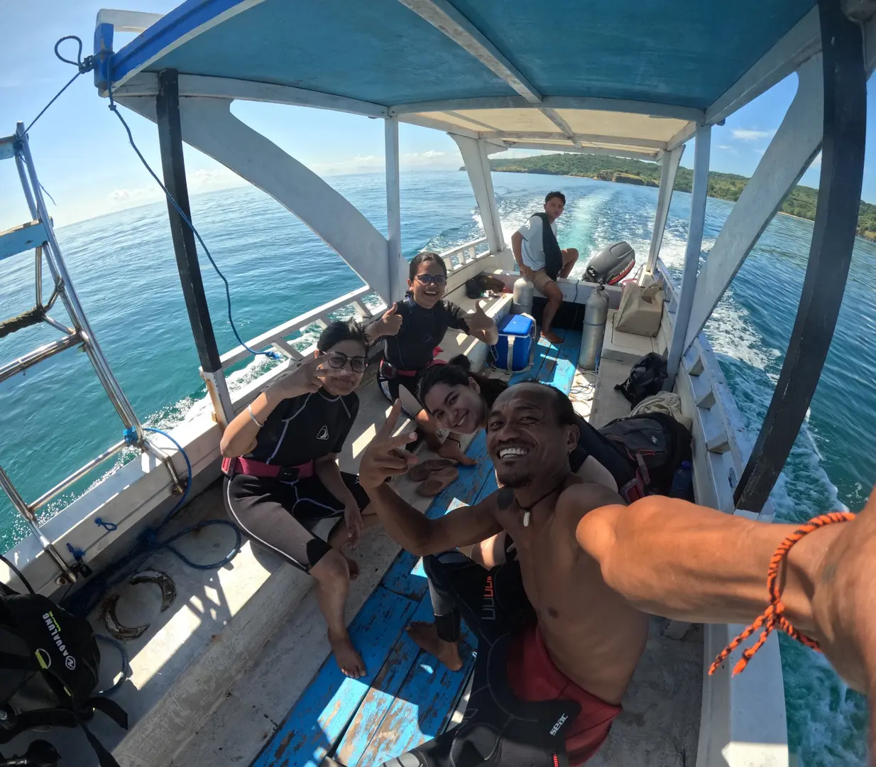 a pool with a table and chairs next to it