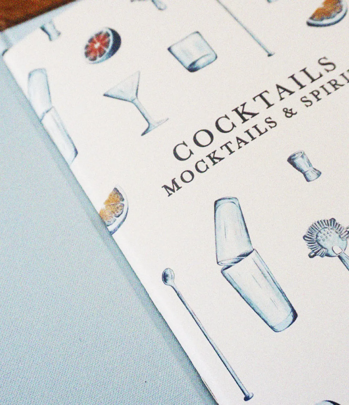 Small Bar cocktail menu cover with hand-drawn bar tool illustrations