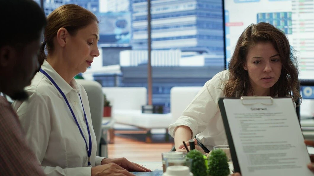 financial-expert-showing-statistics-data-papers-conference-room