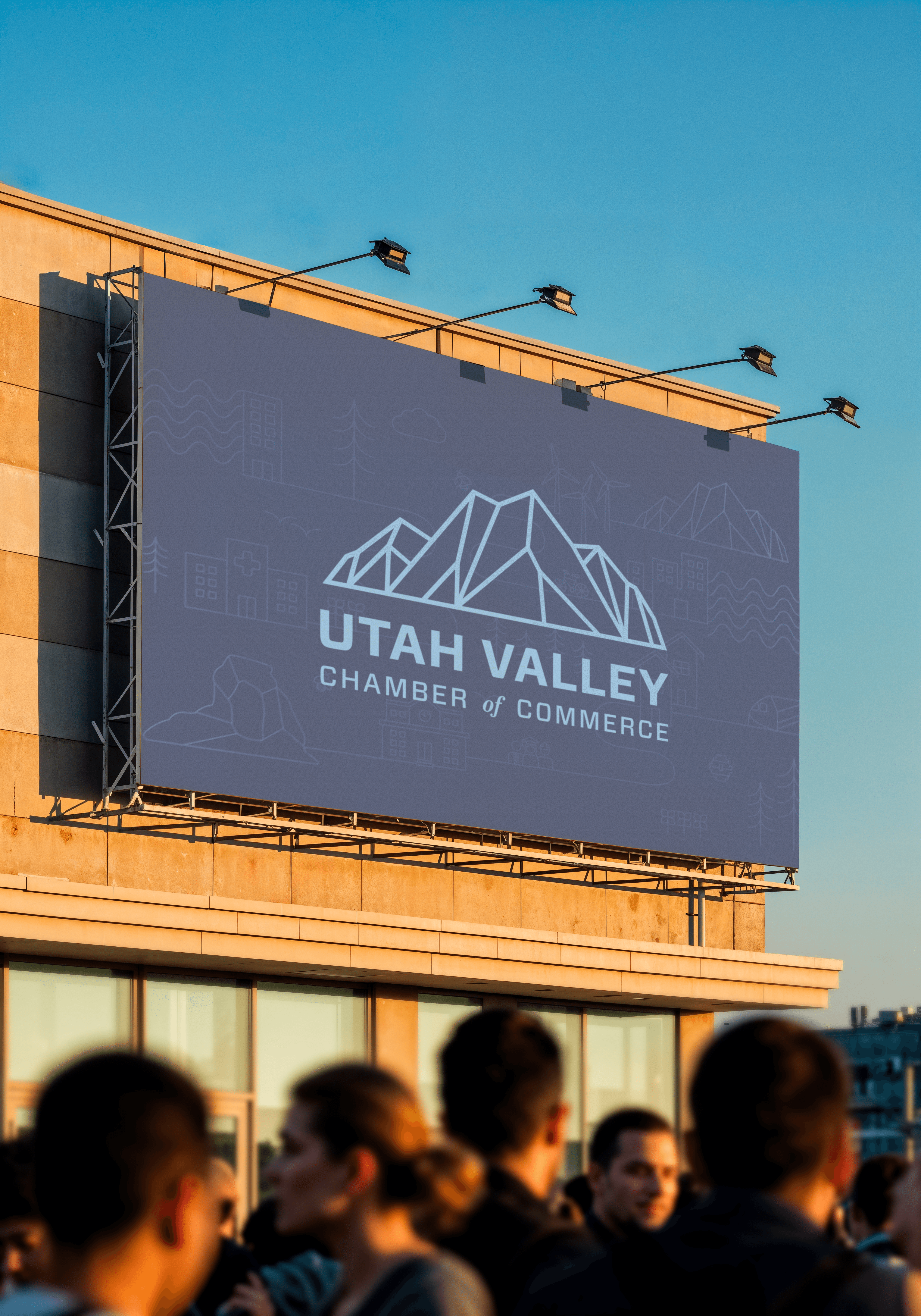 Utah Valley Chamber of Commerce billboard with mountain logo.