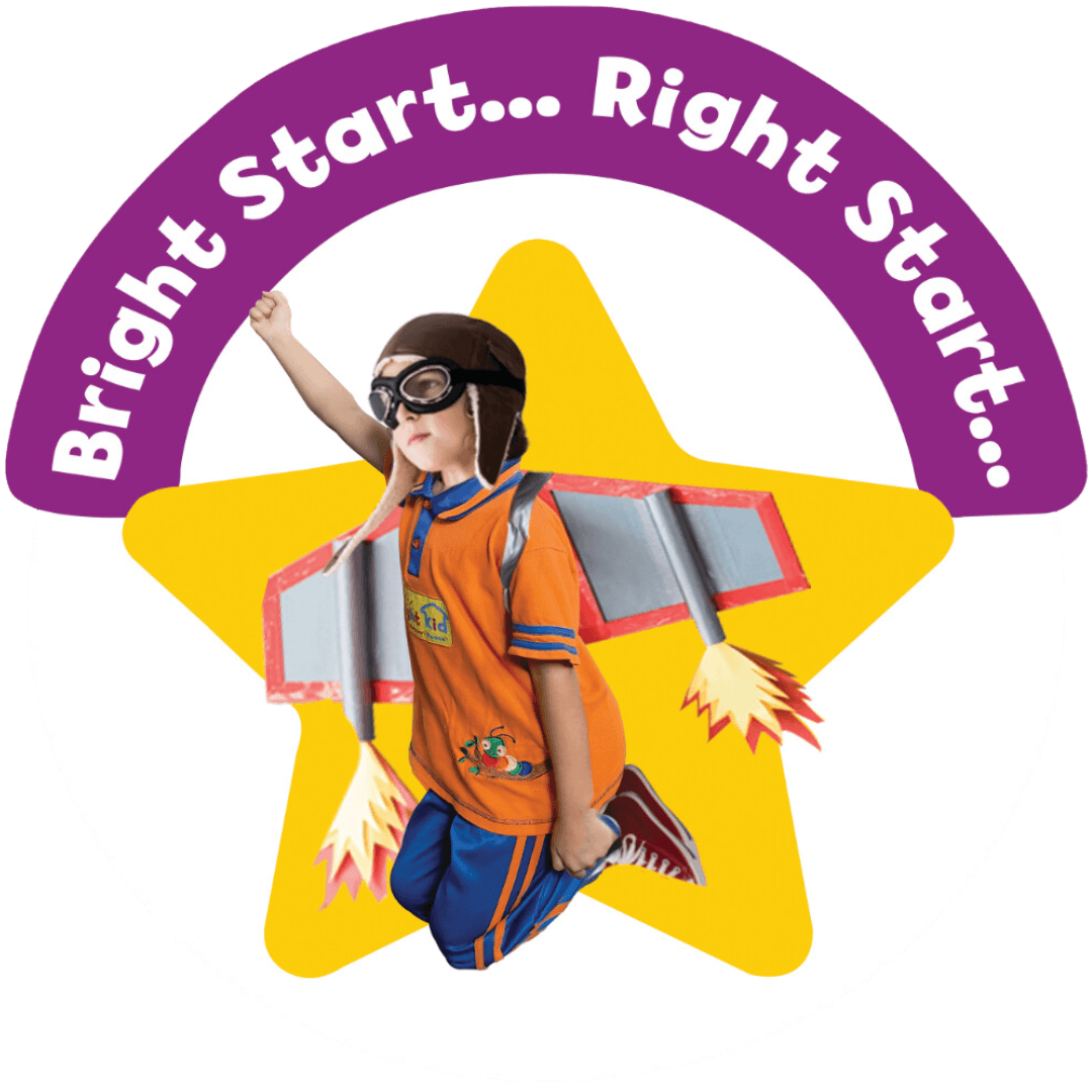 A young child in an orange and blue uniform, representing a preschool franchise, wearing a helmet and rocket-themed backpack, is depicted as if flying. The image includes the tagline 'Bright Start... Right Start...' in a purple arc around the top. The background features a large yellow star, symbolizing the aim of excellence in early childhood education through the best preschool and playschool franchises in India.