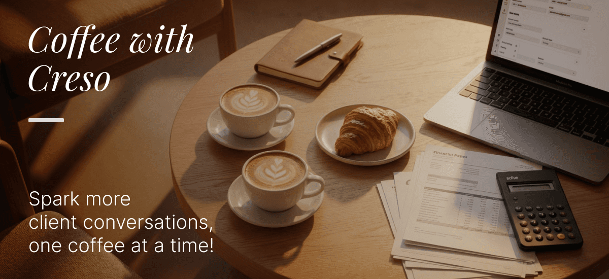 Photograph of a table in a cafe - the table contains a laptop, some financial papers with a calculator, two cups of coffee and a croissant. White text on the image reads: "Coffee with Creso. Spark more client conversations, one coffee at a time!"
