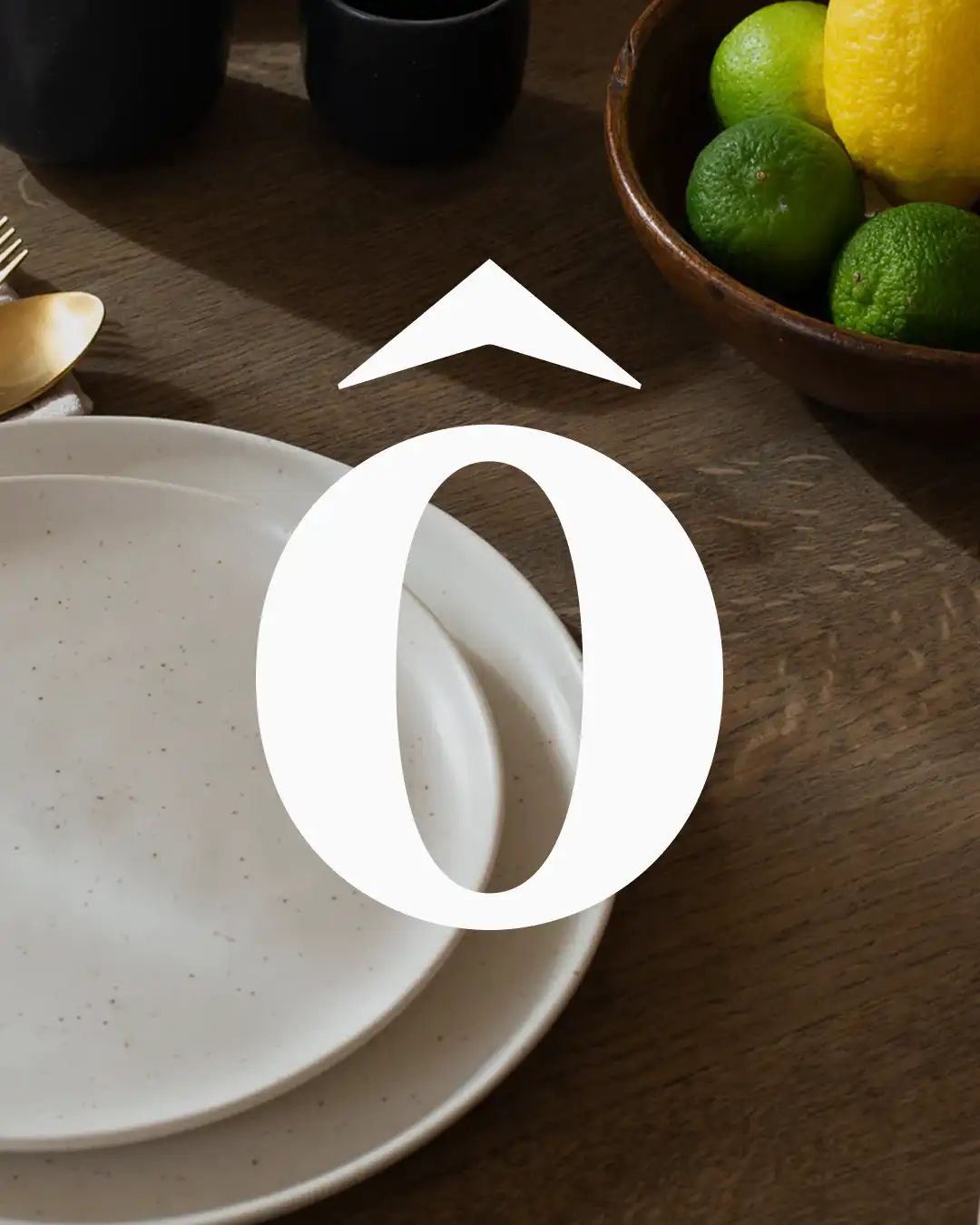 Brand identity design for Pôramesa, a premium Swiss dinnerware and homeware brand. The image features handmade ceramic plates, warm table styling, citrus details, and the Pôramesa logo, reflecting the brand’s focus on timeless tableware, hospitality, and sustainable dining.