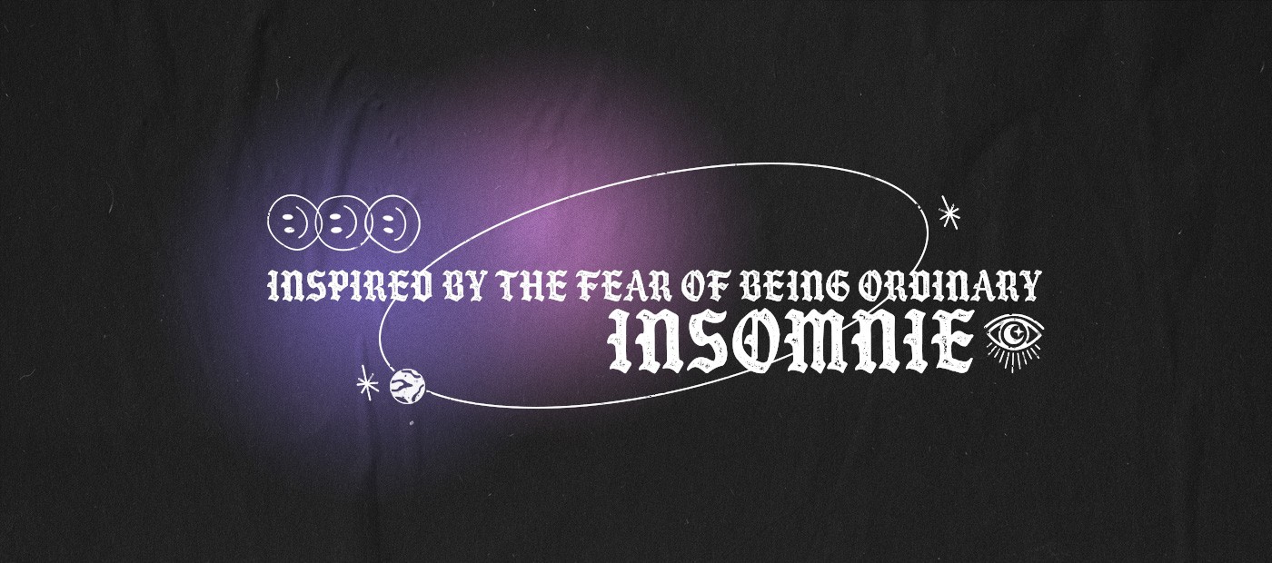 Modern buildings with geometric patterns against dark sky