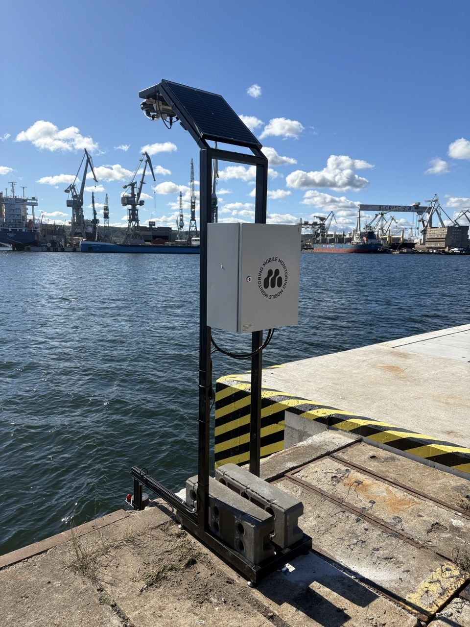 Fashion photoshoot with a woman posing in a dress