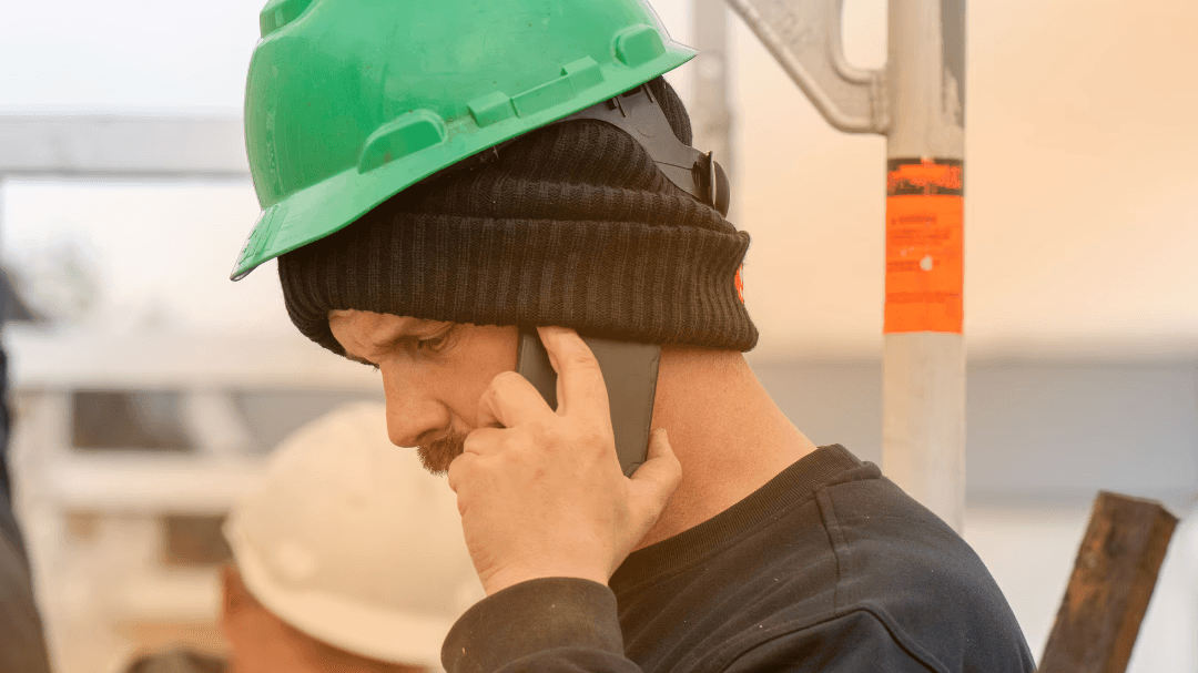 Worker man on the phone looking frustrated