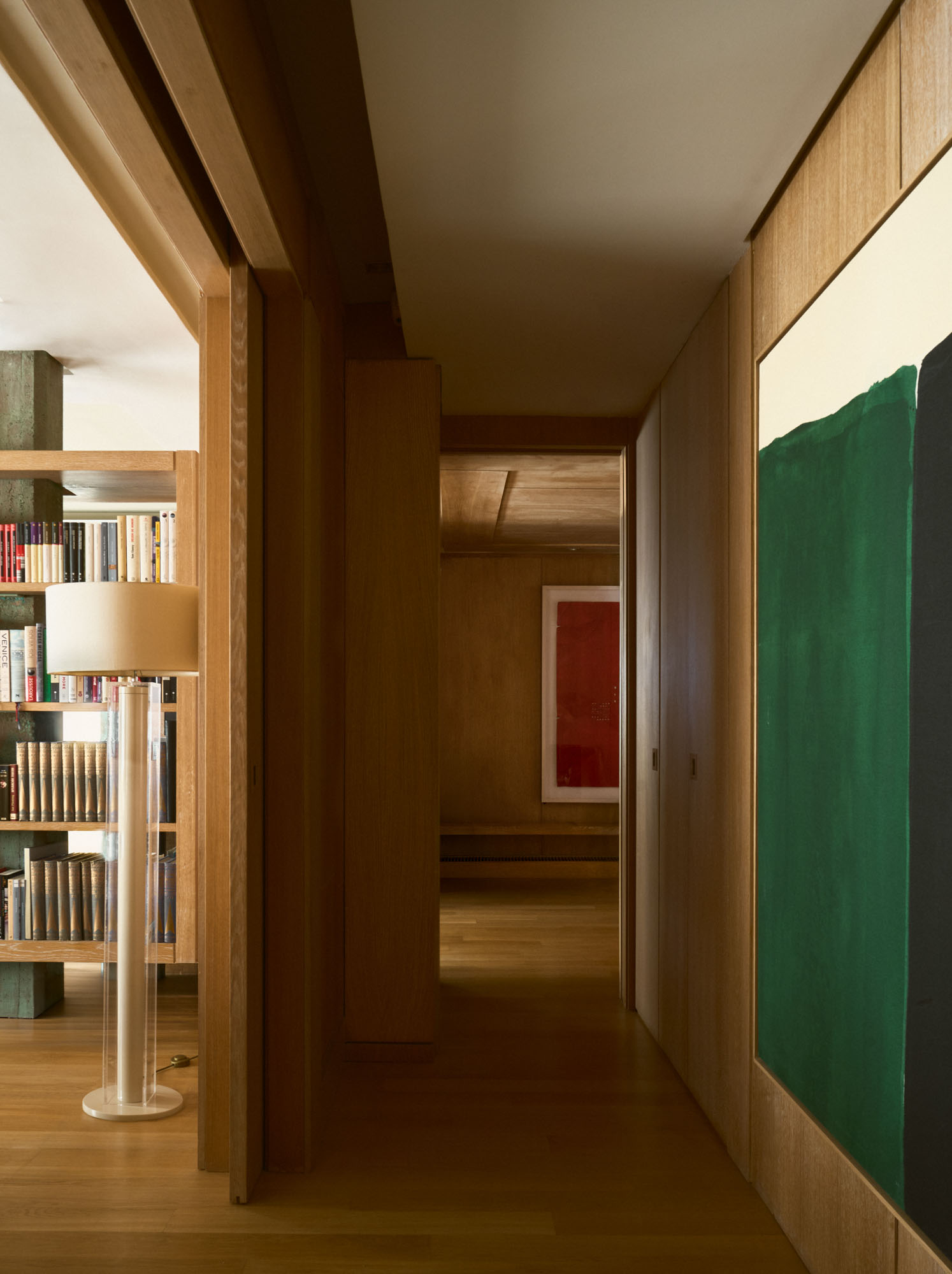 Timber-lined corridor connecting the living spaces of Bea Bonilla’s home.