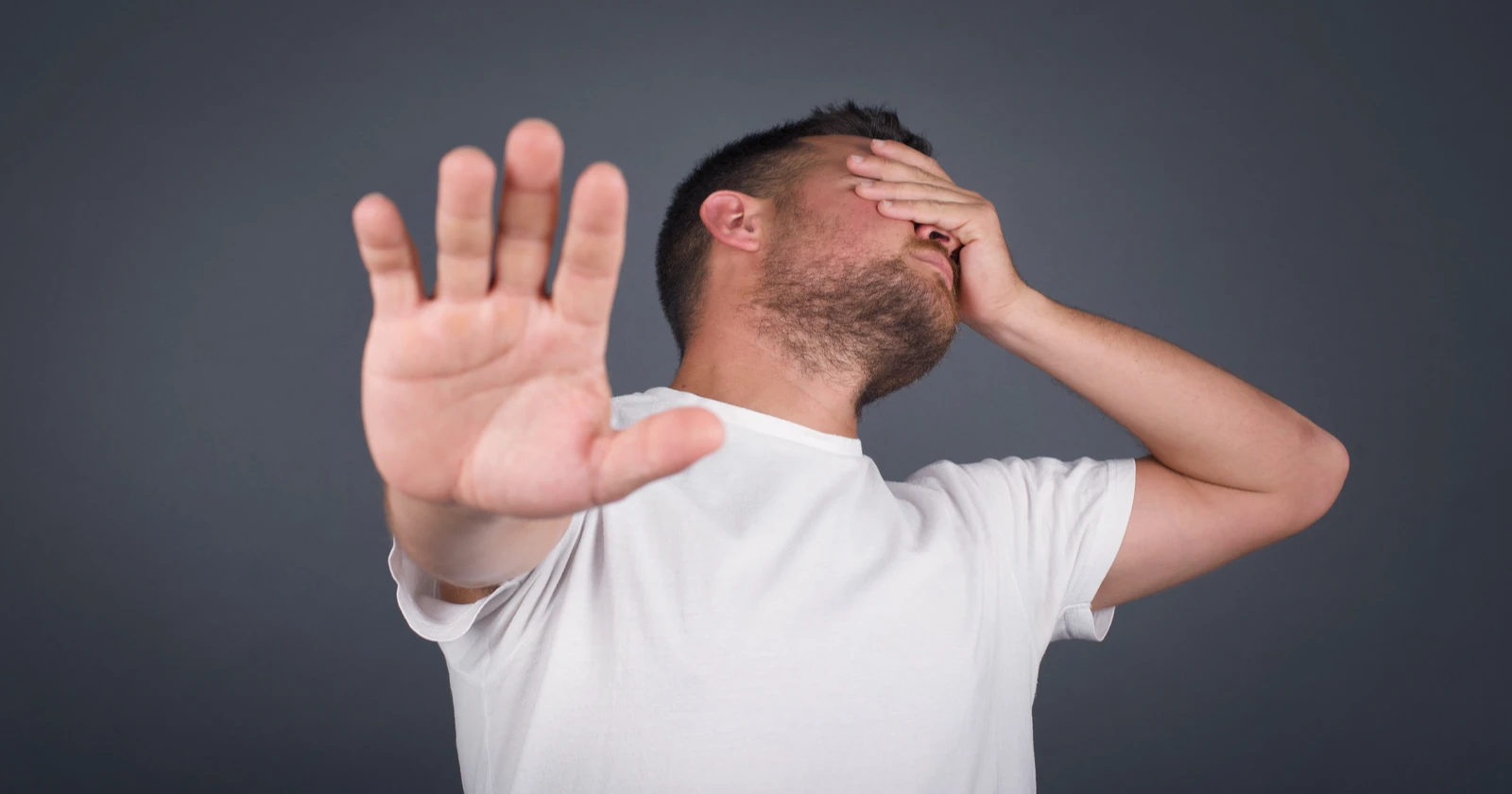 Influencer gesturing stop sign to represent avoiding external links and protecting TikTok Shop commissions.