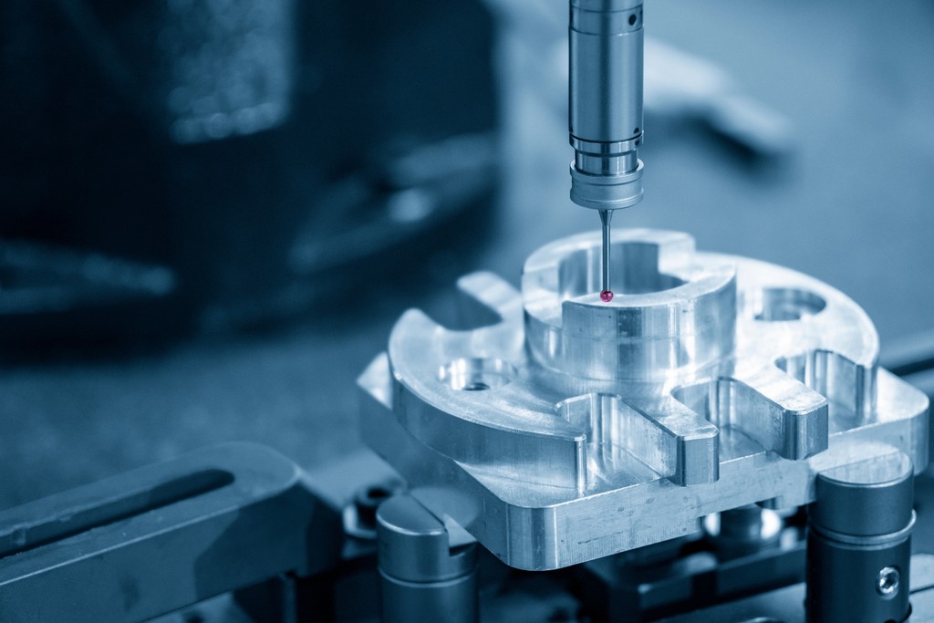 husband and wife working happily on a laptop