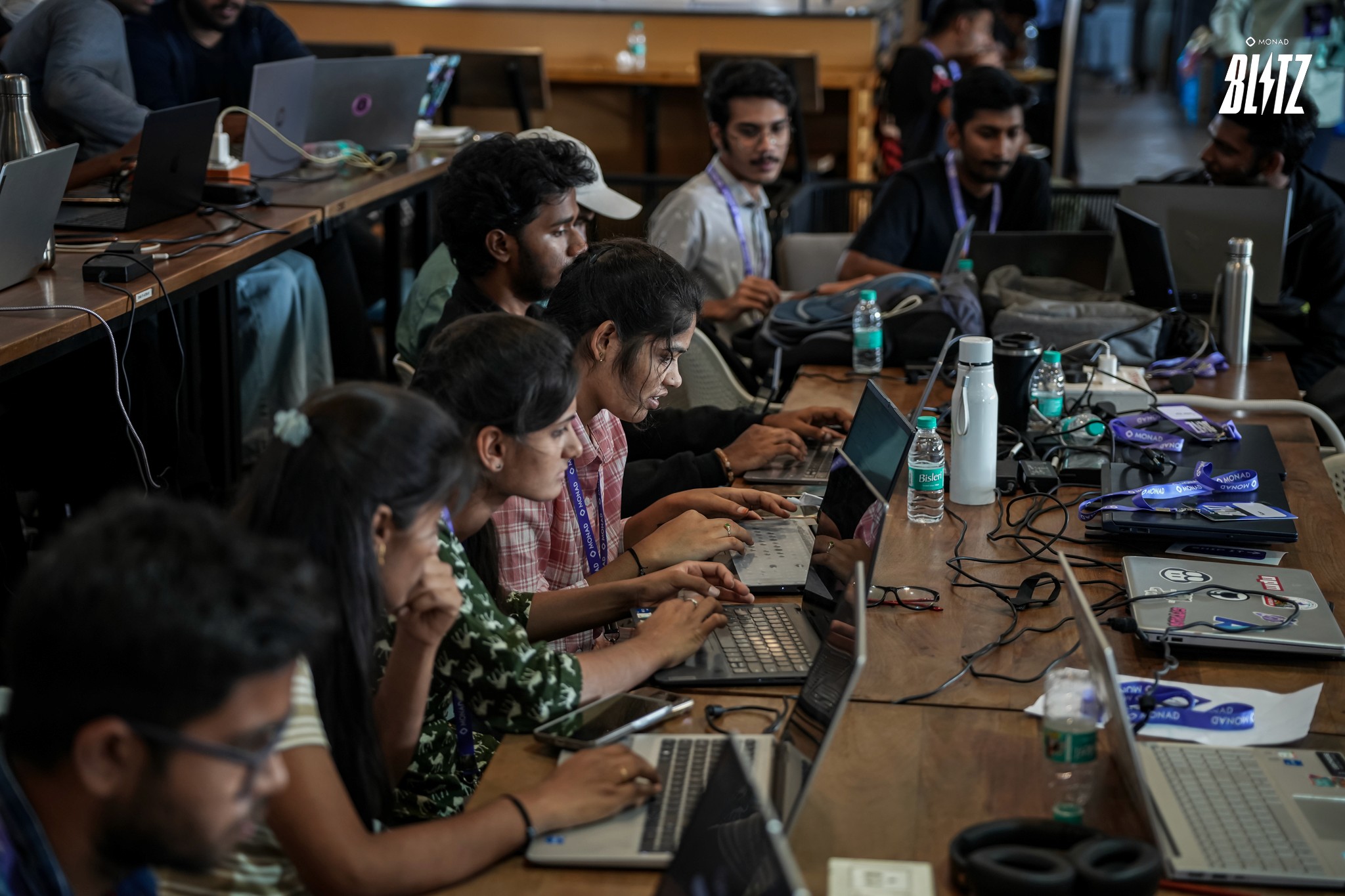Developers coding during Monad Blitz Hyderabad one-day Web3 hackathon