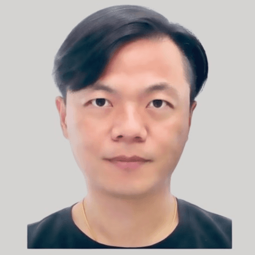 smiling man wearing black turtleneck shirt holding camrea