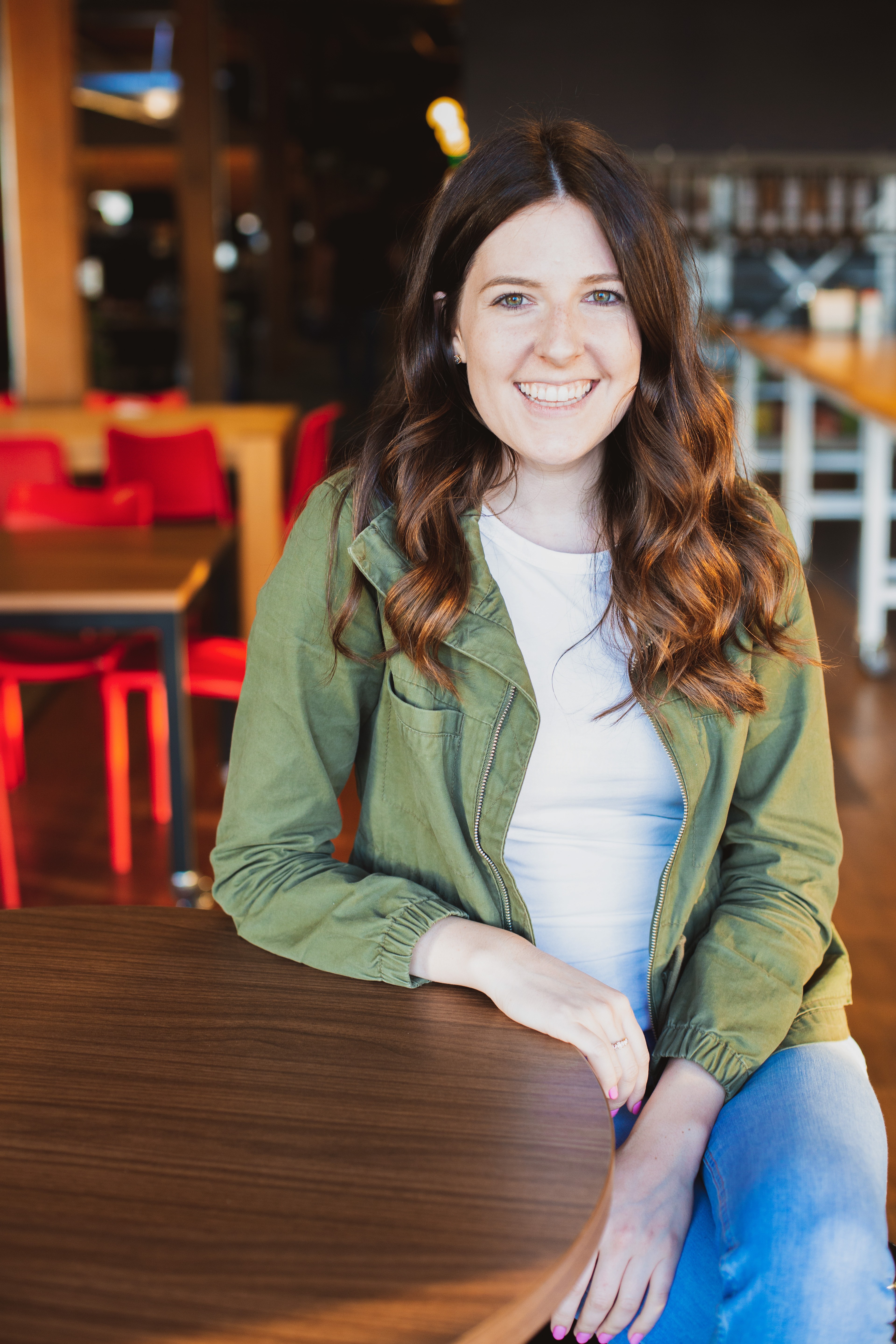 Designer Amy sitting at a table