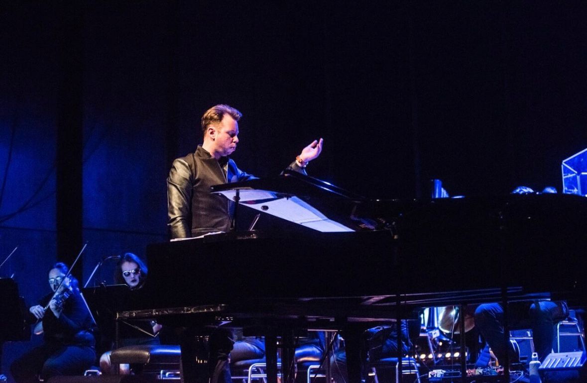 female photographer with red hair