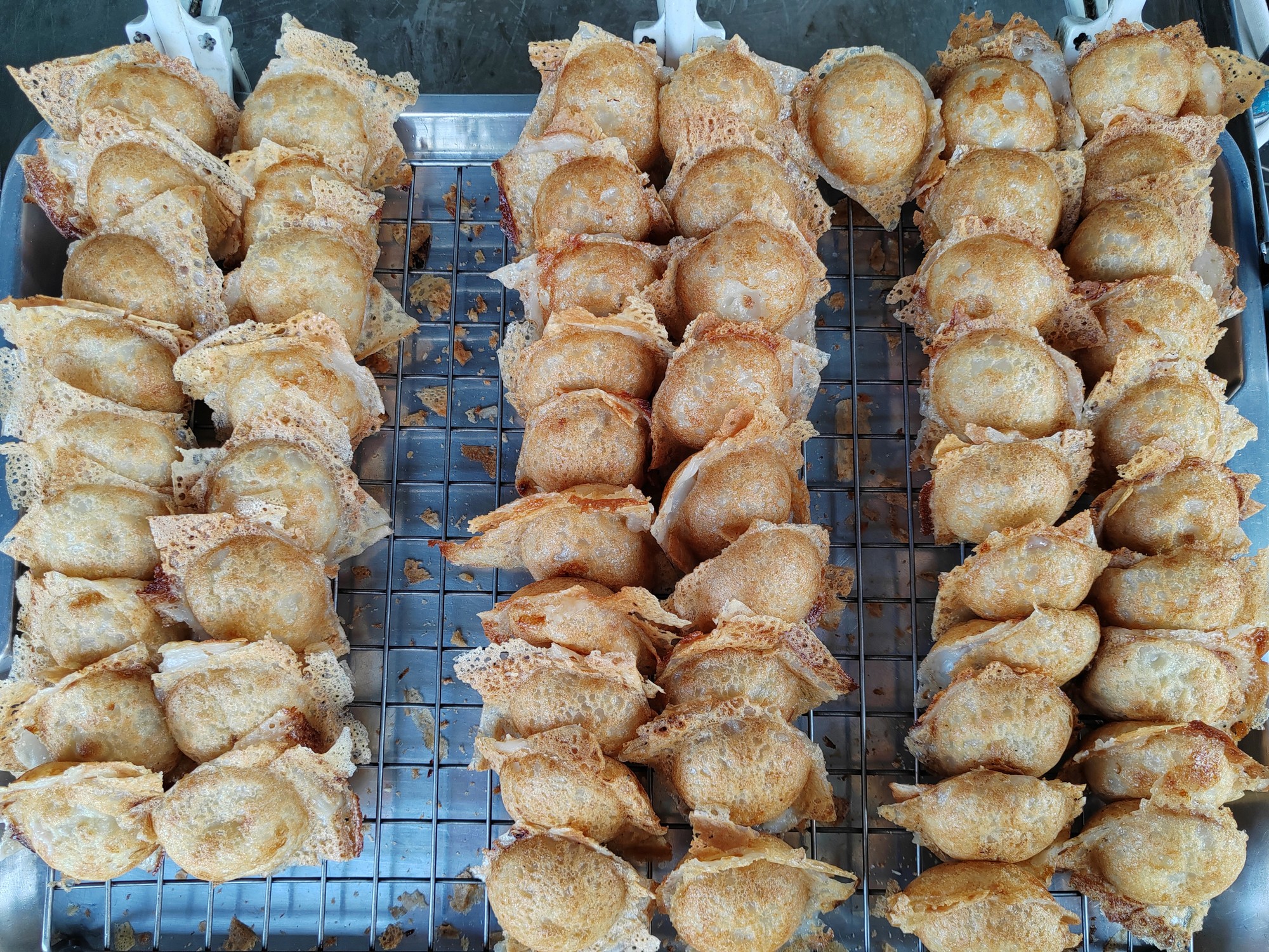 a person is holding a bowl of ice cream