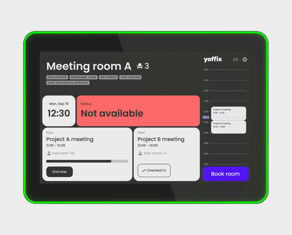 Meeting room display screen in Yoffix showing current booking status, room details, next meetings, and a book room button for hybrid workplace teams
