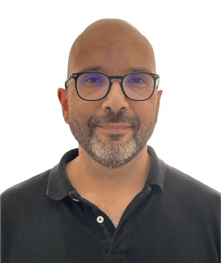 Dr. Hugo Lisboa, Chief Technology Officer. Smiling portrait wearing glasses