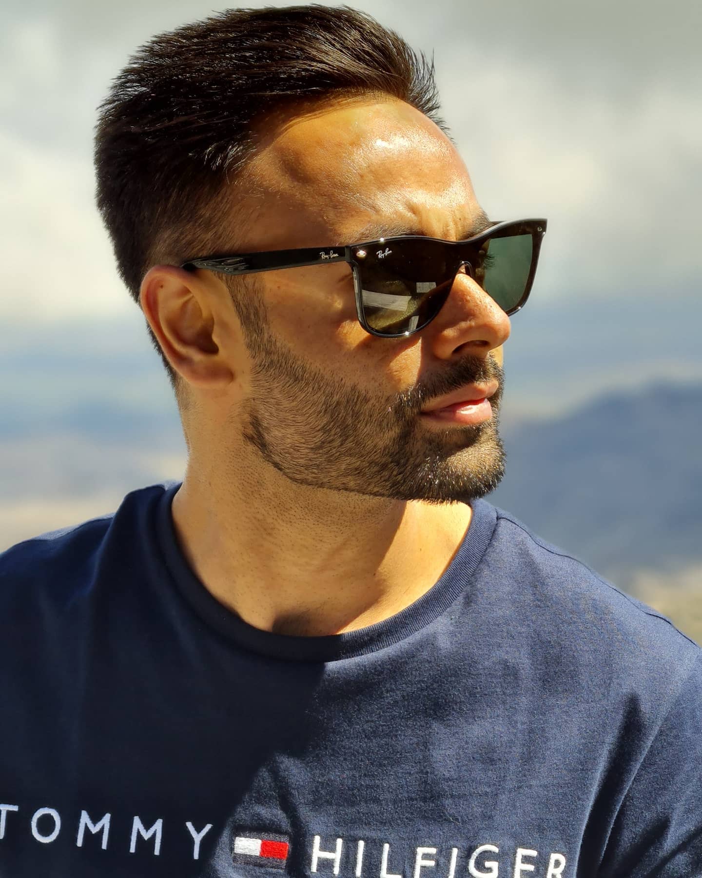 Portrait of a woman standing at a bar