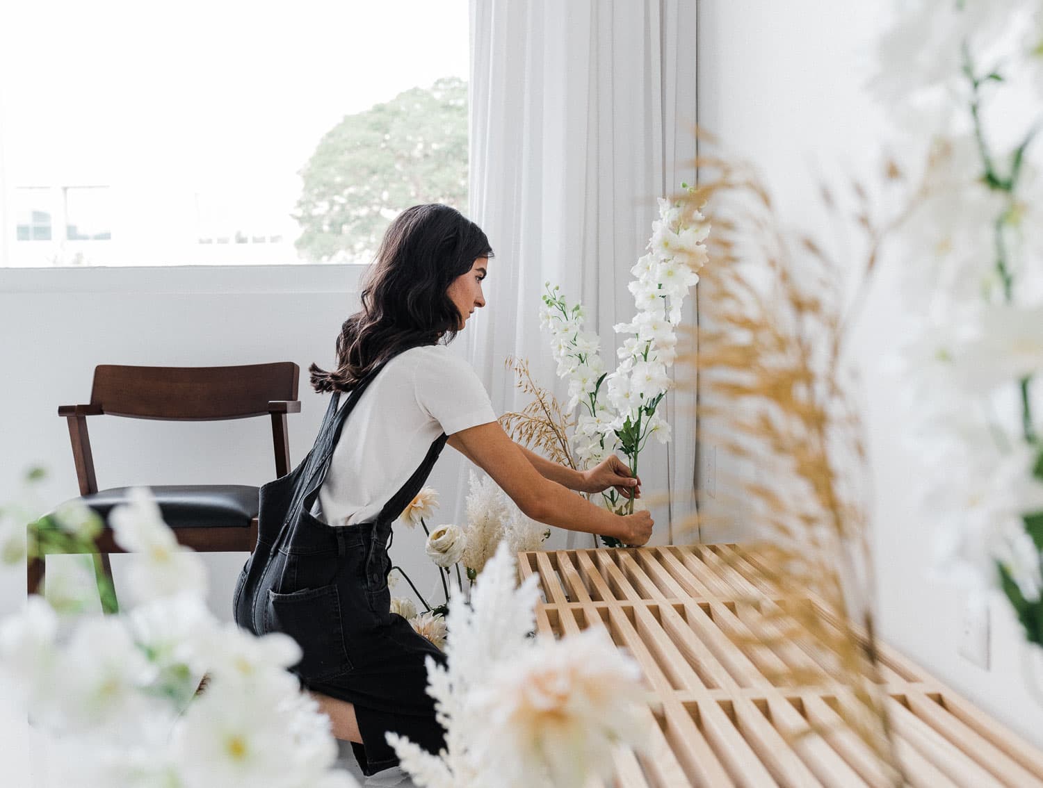 Woman decorating with flowers