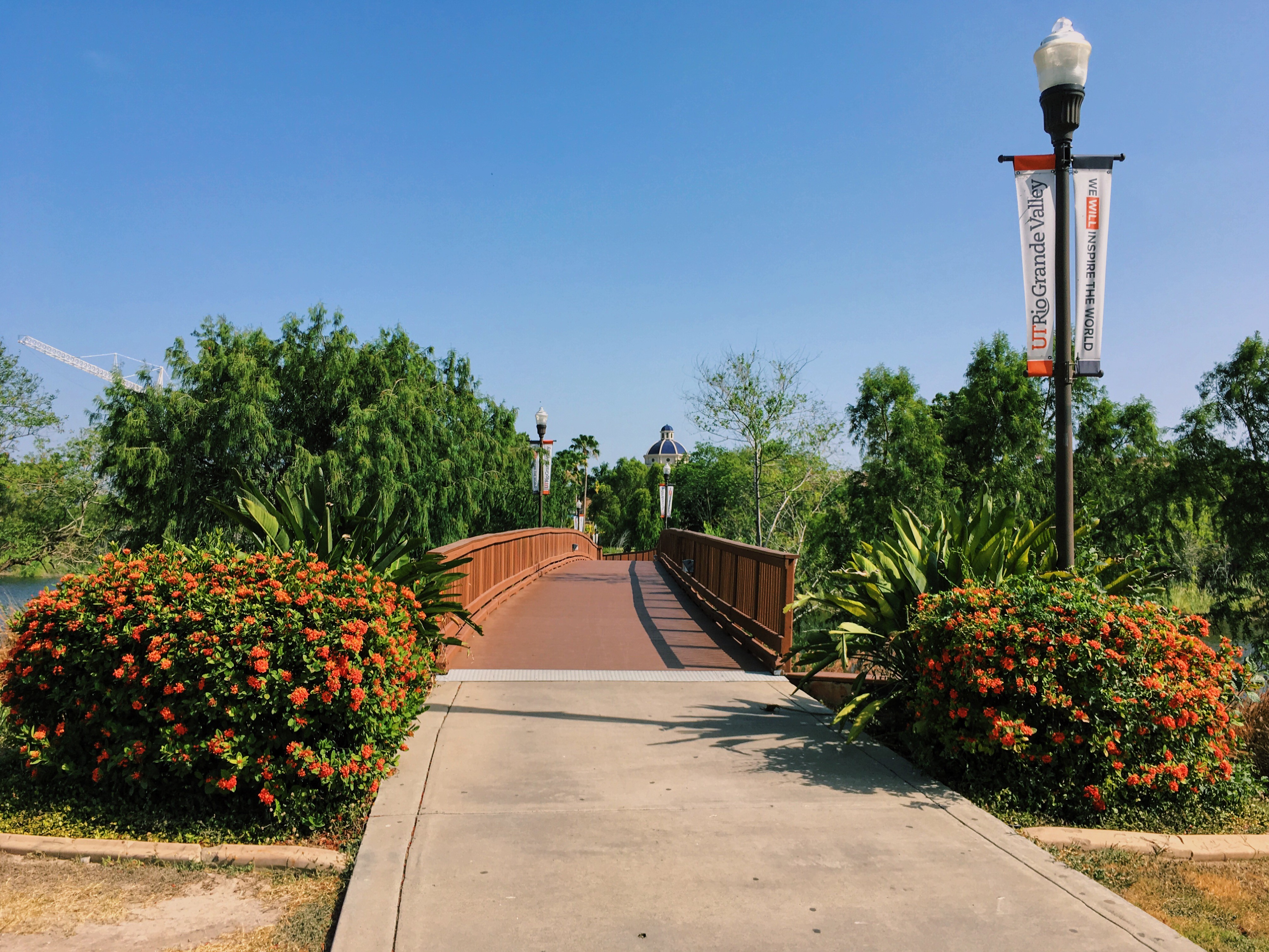 two people in kayaks paddling on the water