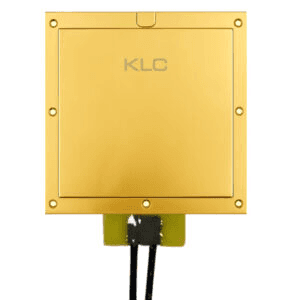 a close up of a red wall with metal rivets