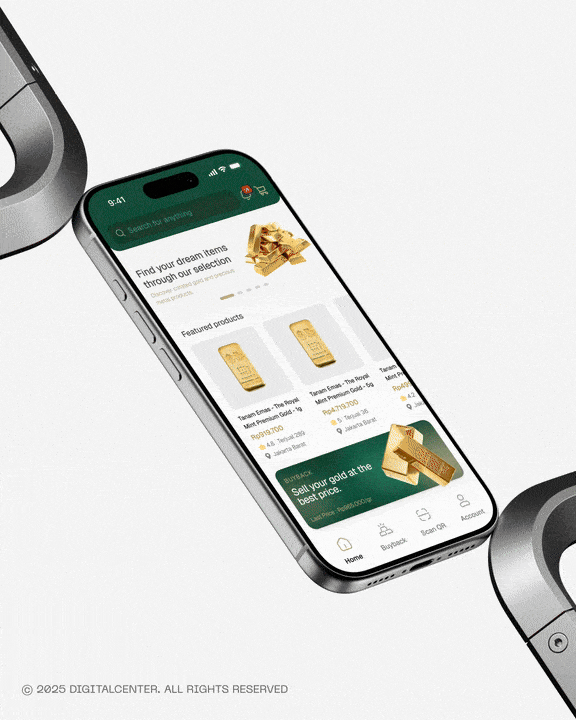 Close-up portrait of a person wearing a gray insulated hooded jacket with the hood up, showing their face framed by the hood against a light background.