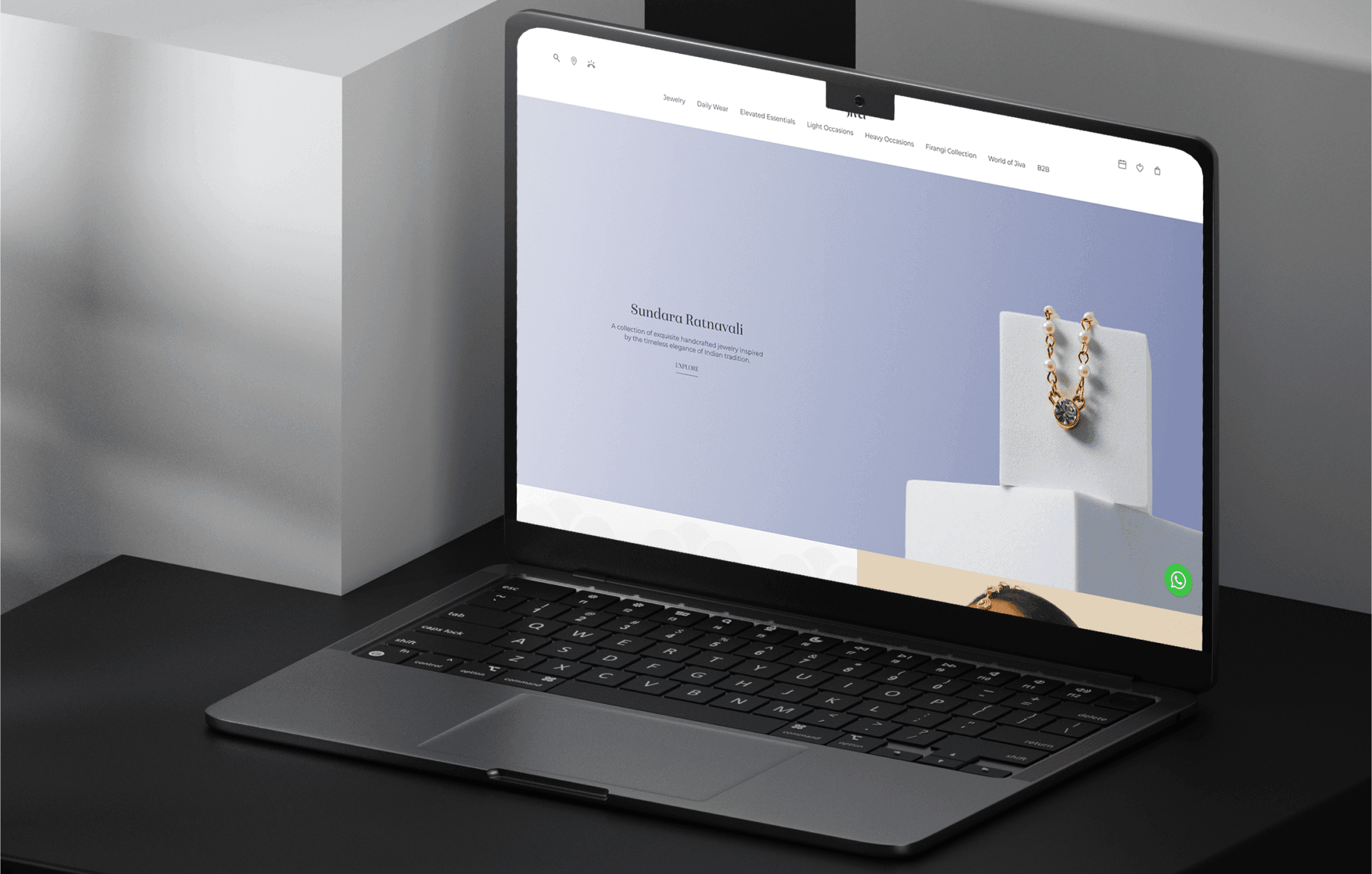 "Luxury jewelry website displayed on a sleek laptop, featuring elegant gold necklace designs and a minimal, modern user interface. Ideal for digital marketing, e-commerce jewelry branding, and online shopping experiences."