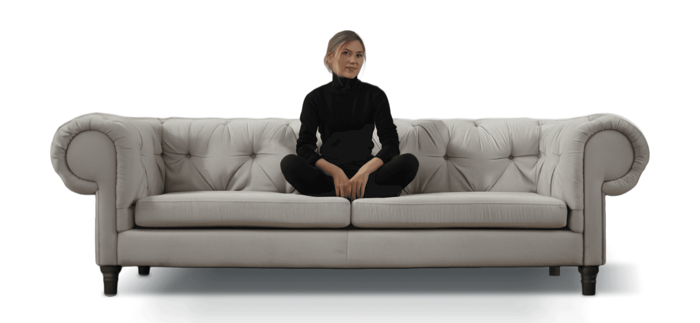 Woman sitting on couch.