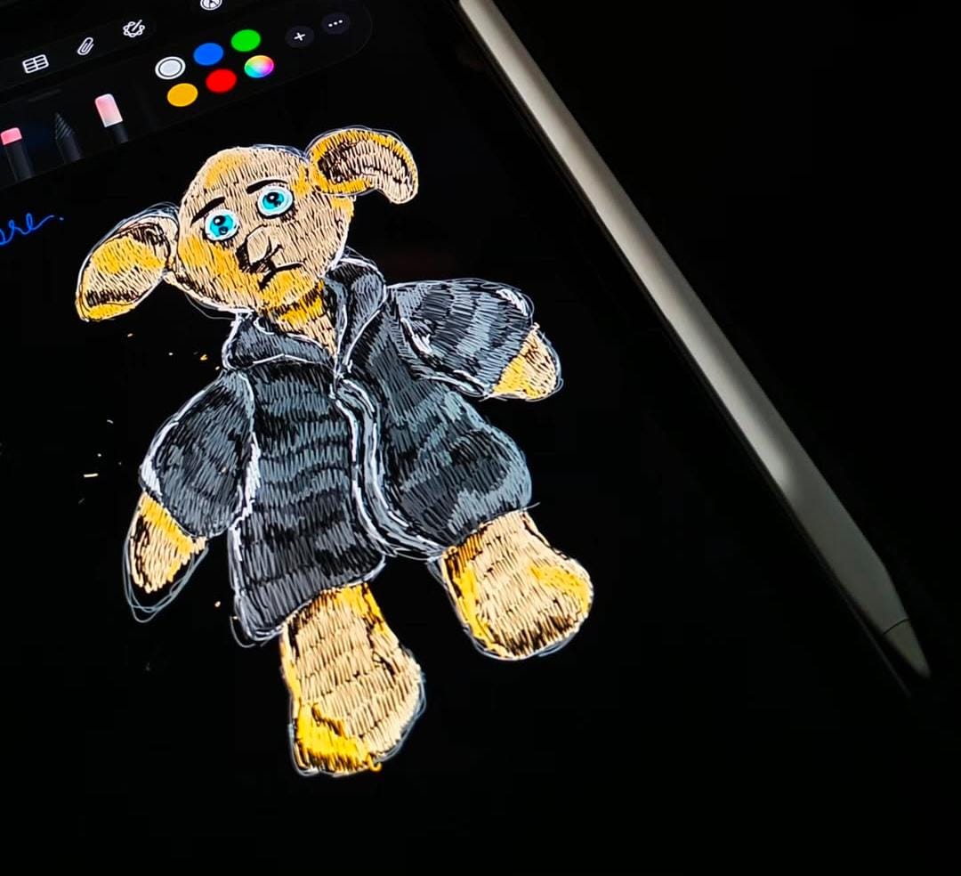 Full moon rising over a dark, silhouetted mountain ridge.