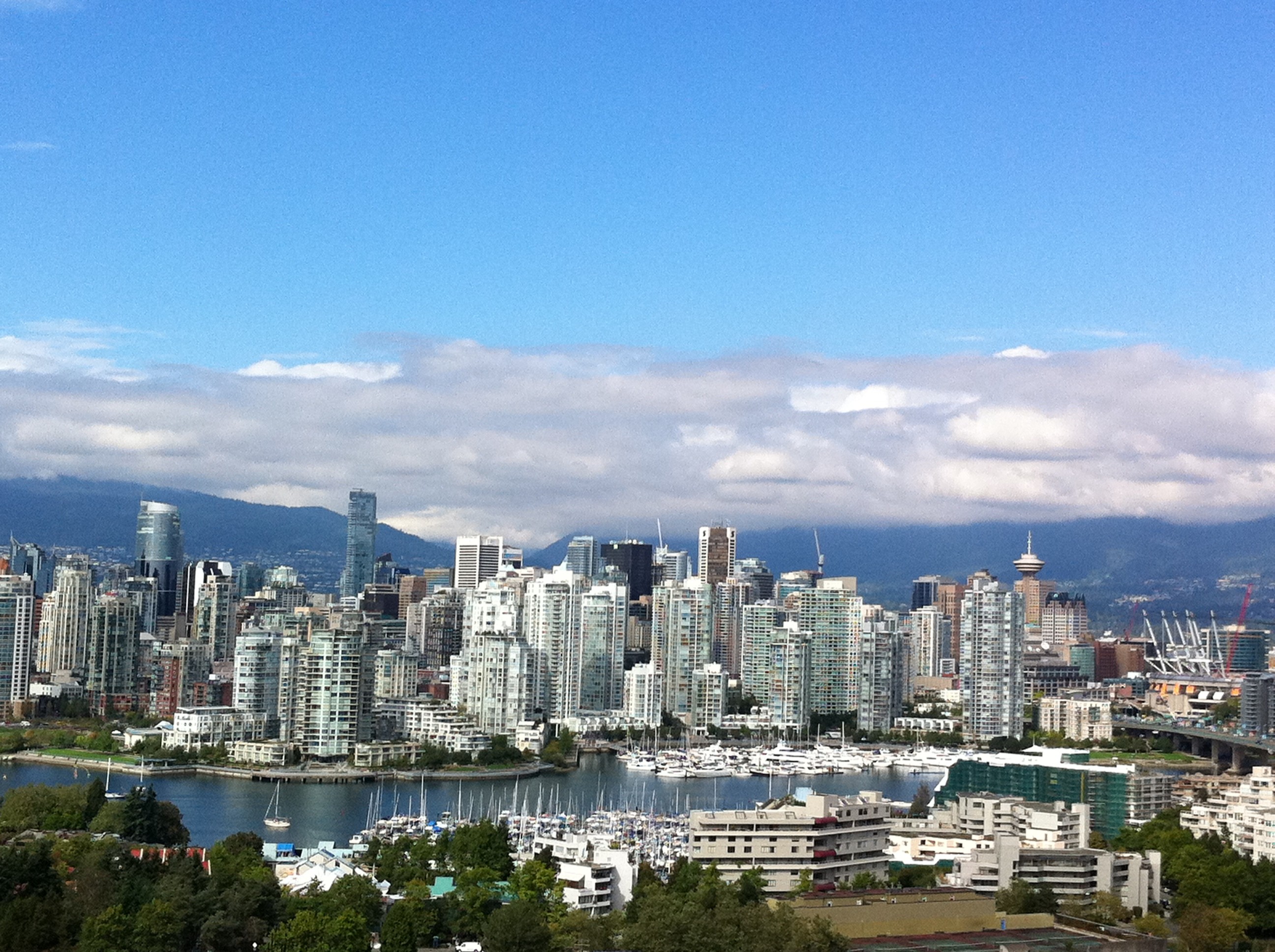 Vancouver skyline with high-rise condos and mountains