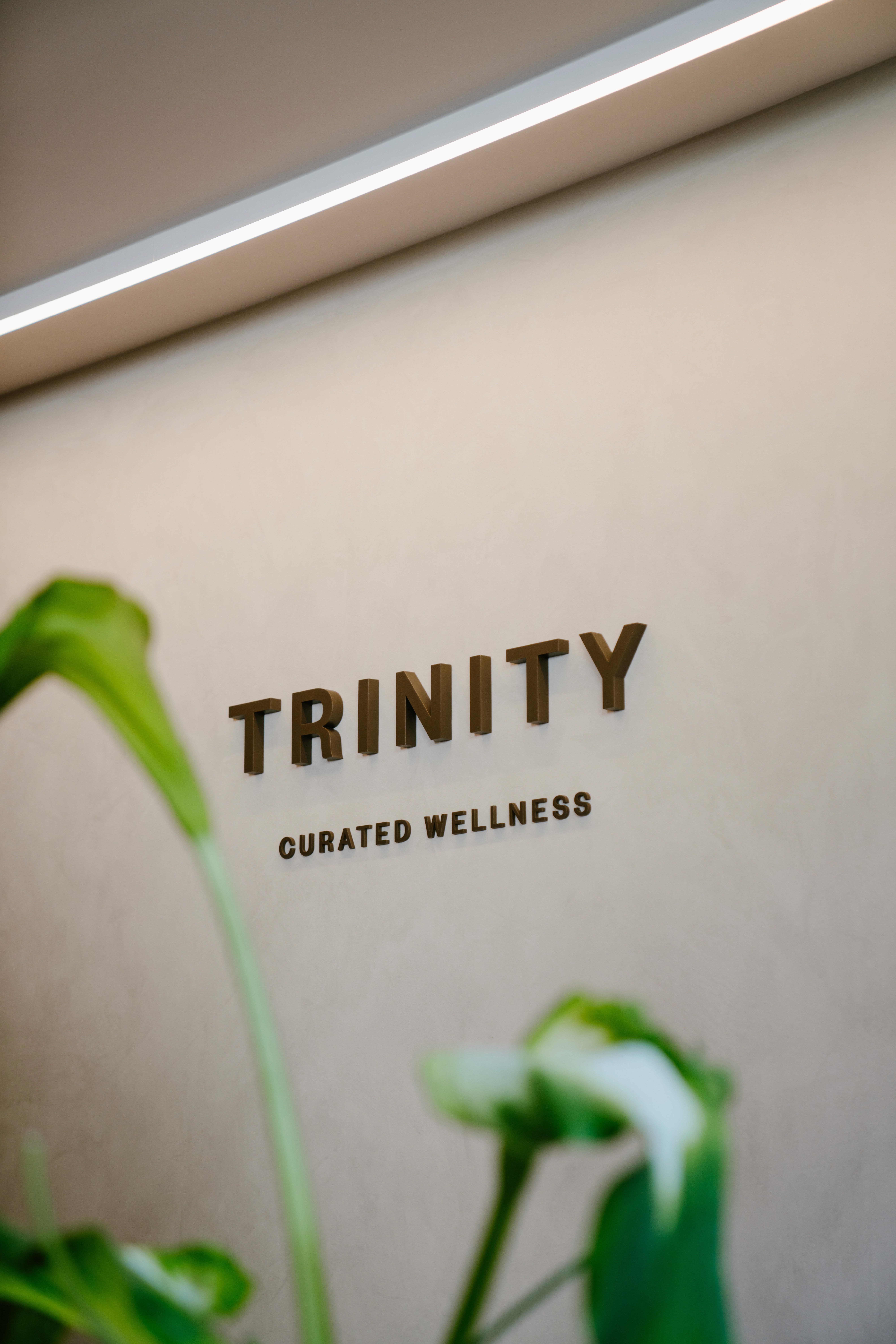 A man floating on water with his eyes closed, immersed in deep relaxation.