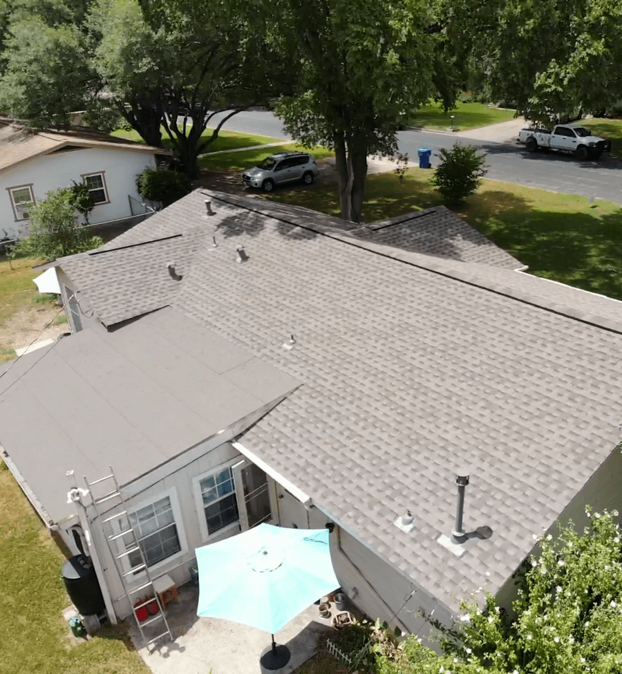 Shingle roof with modified bitumen low slope area for code requirements in san antonio texas. 