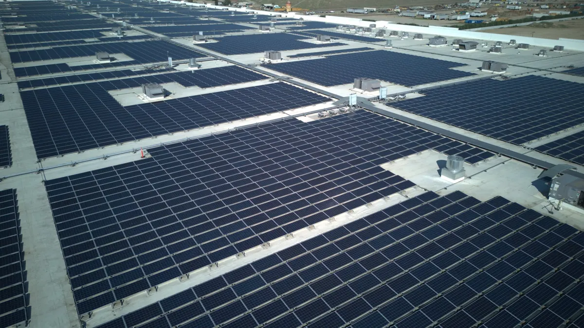 Rooftop solar panel rows at FAT1 Amazon in Fresno, CA
