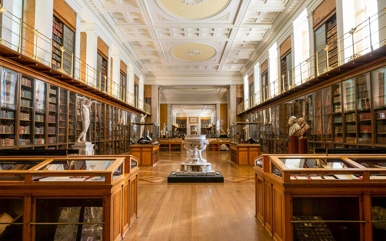 Enlightenment Room exhibits at British Museum, London with historical artifacts.