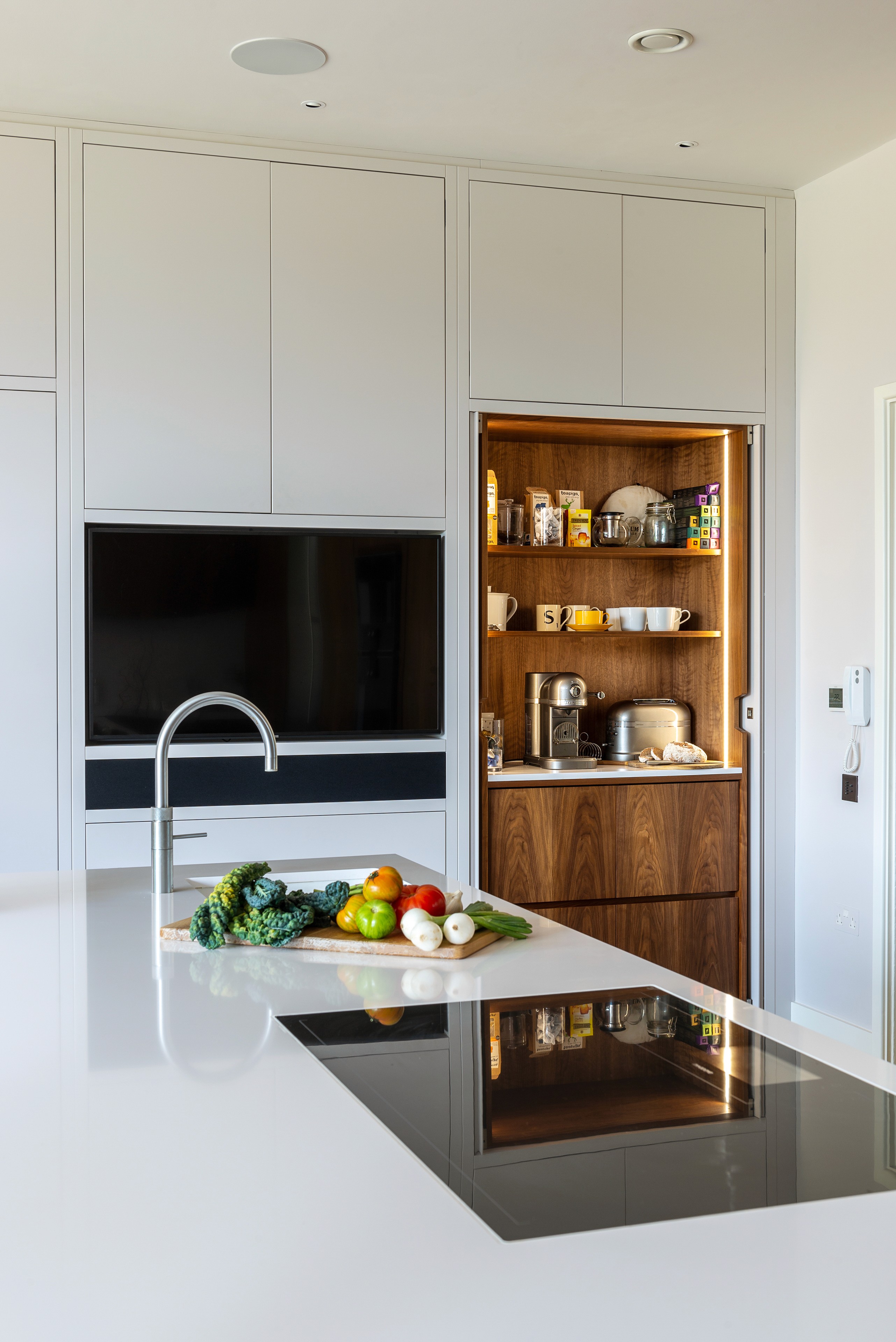 Integrated Gaggenau and Miele and Quooker appliances in a bespoke kitchen, Chislehurst