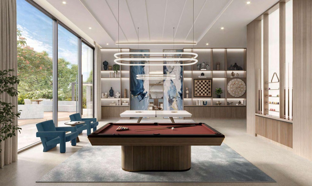 Contemporary living room and kitchen area in Windsor House II, highlighting modern furniture and an inviting atmosphere