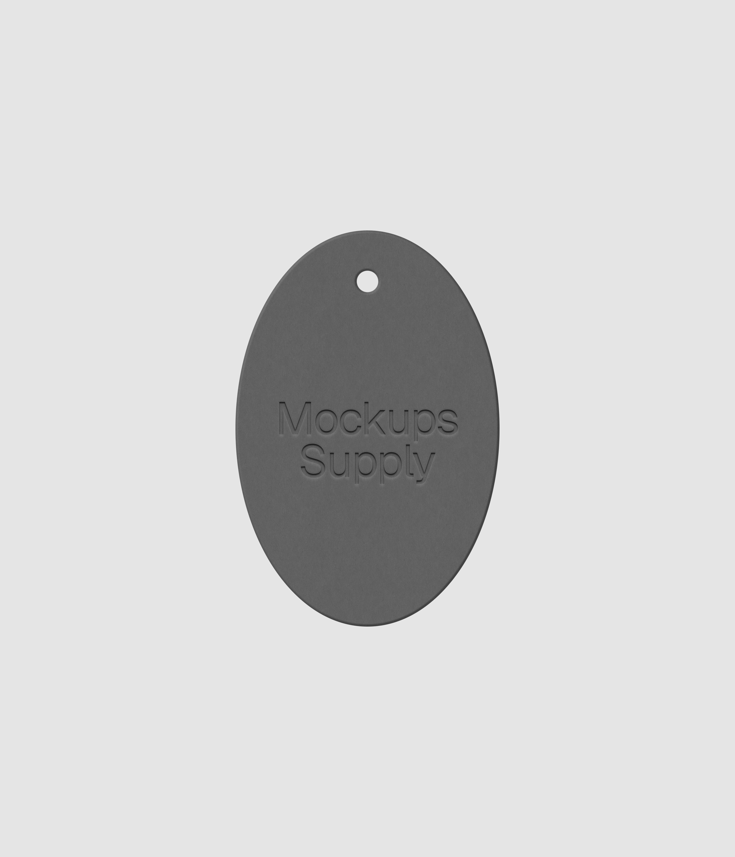 White vertical oval clothing tag featuring embossed logo design on dark backdrop for premium brand identity 2x3 mockup