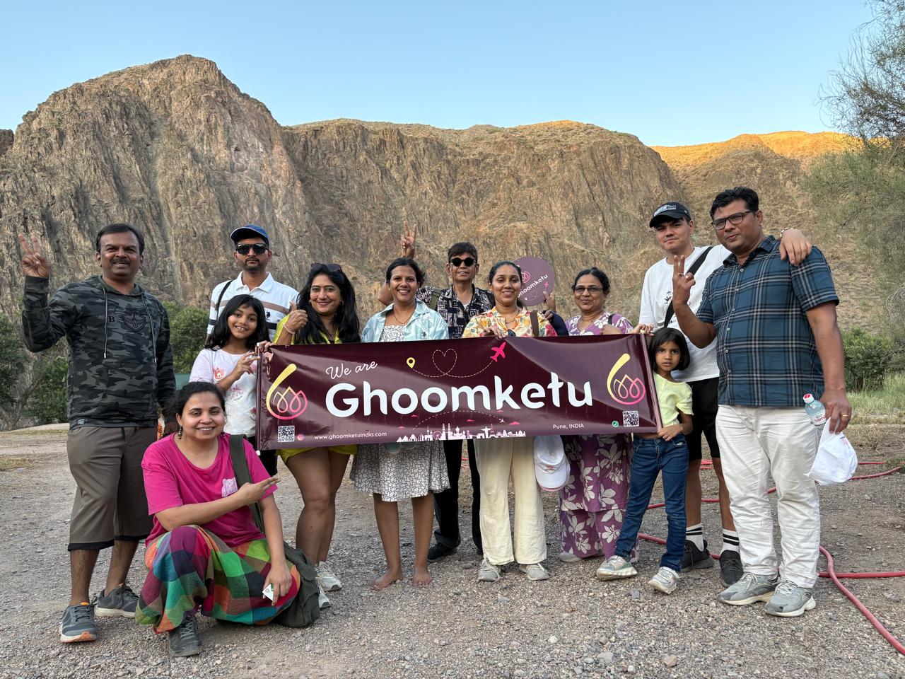 photo of house near cliff and body of water
